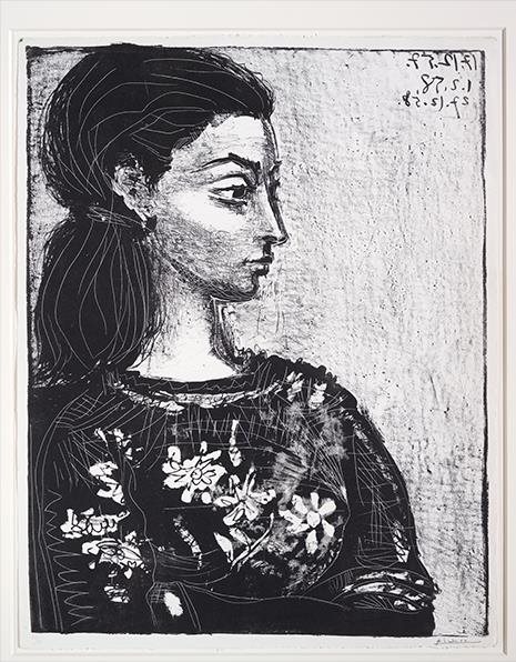 WOMAN WITH A FLOWERED BLOUSE